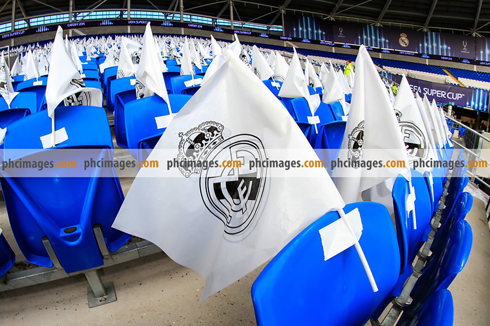 Real Madrid flags on seats before the match