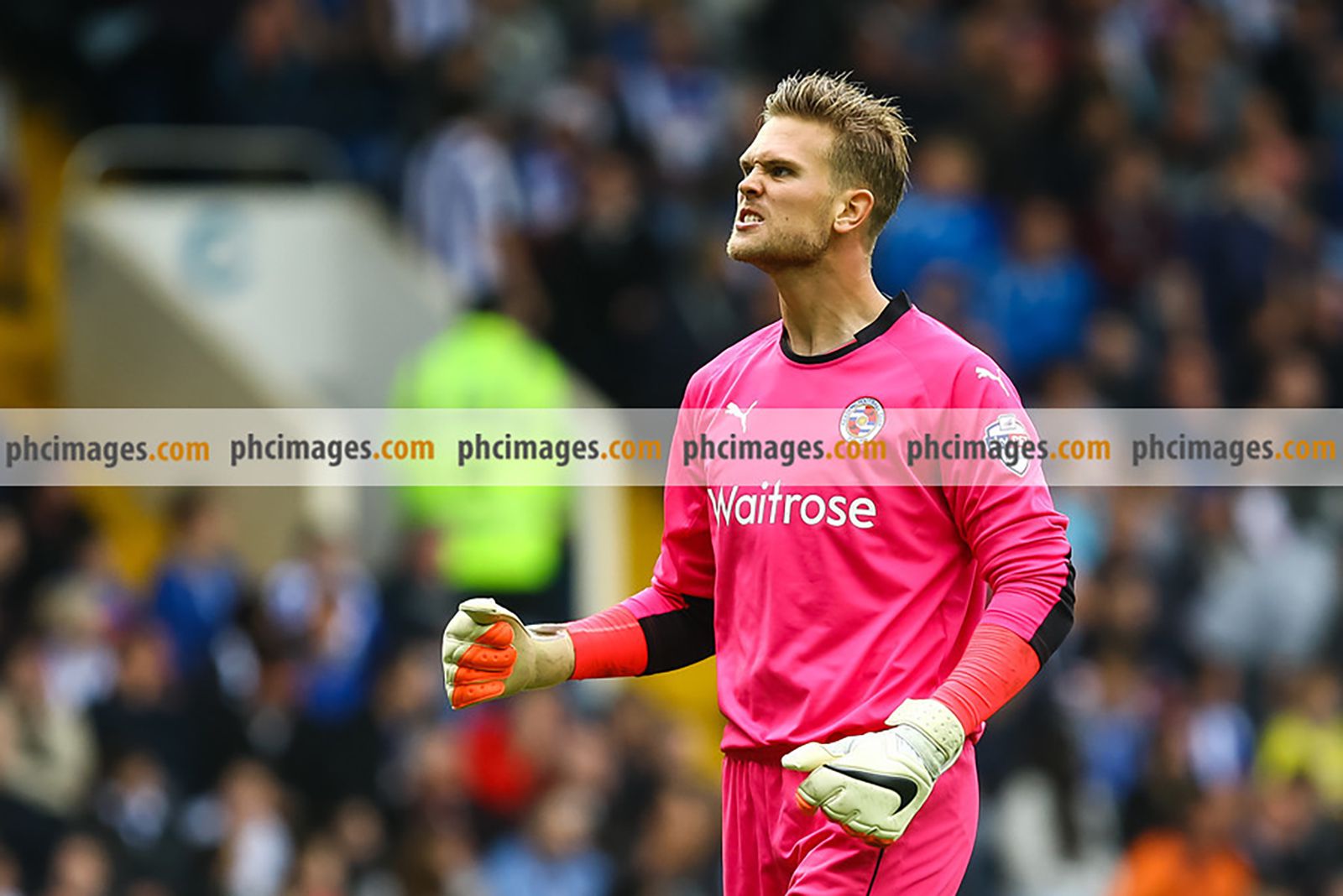Mikkel Andersen celebrates after Reading are awarded a penalty