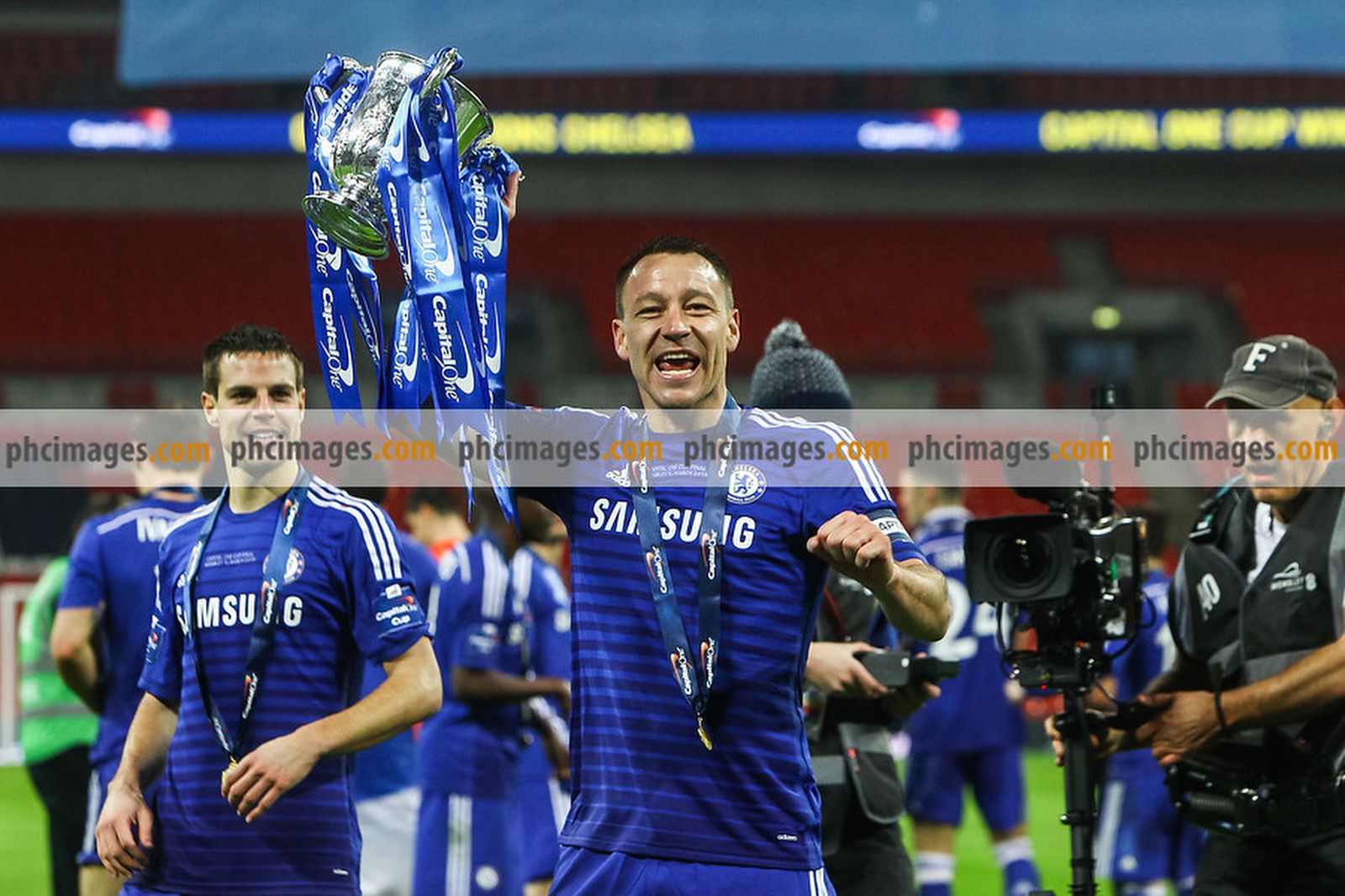 John Terry celebrates with the trophy
