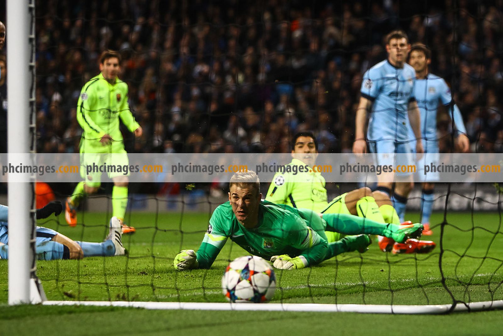 Joe Hart watches on as Suarez scores his second