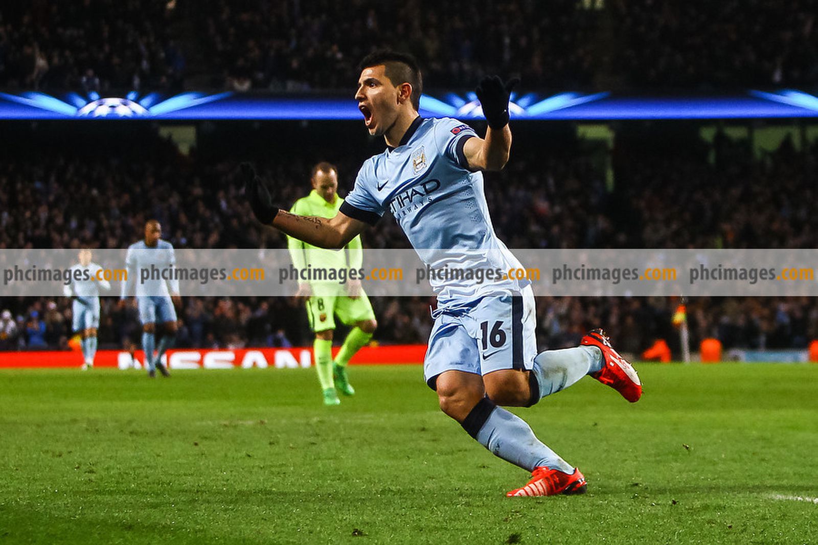 Aguero celebrates after pulling one back
