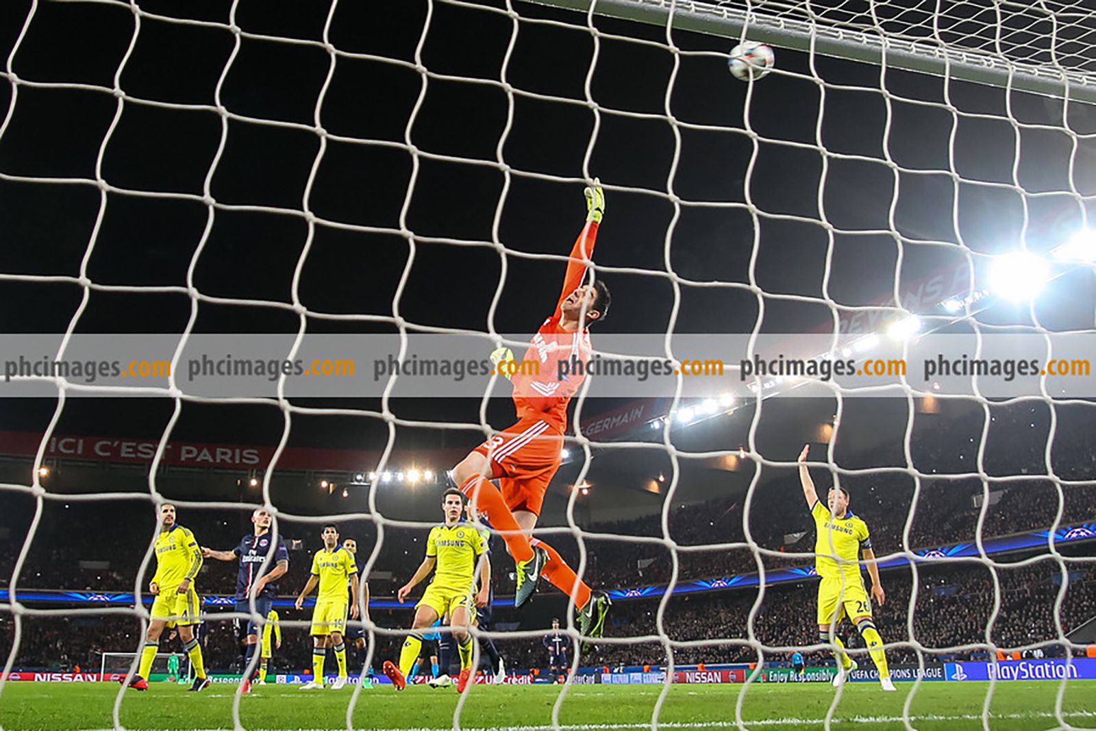 Courtois tips a shot over the bar