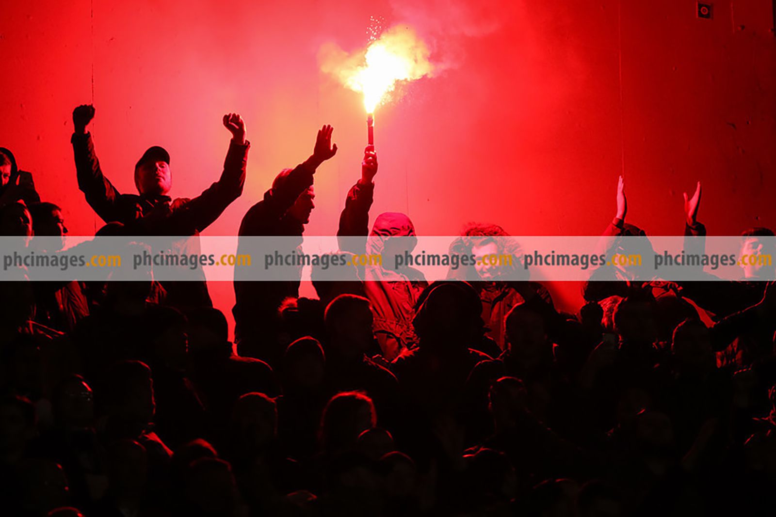 Chelsea fans let off a flare
