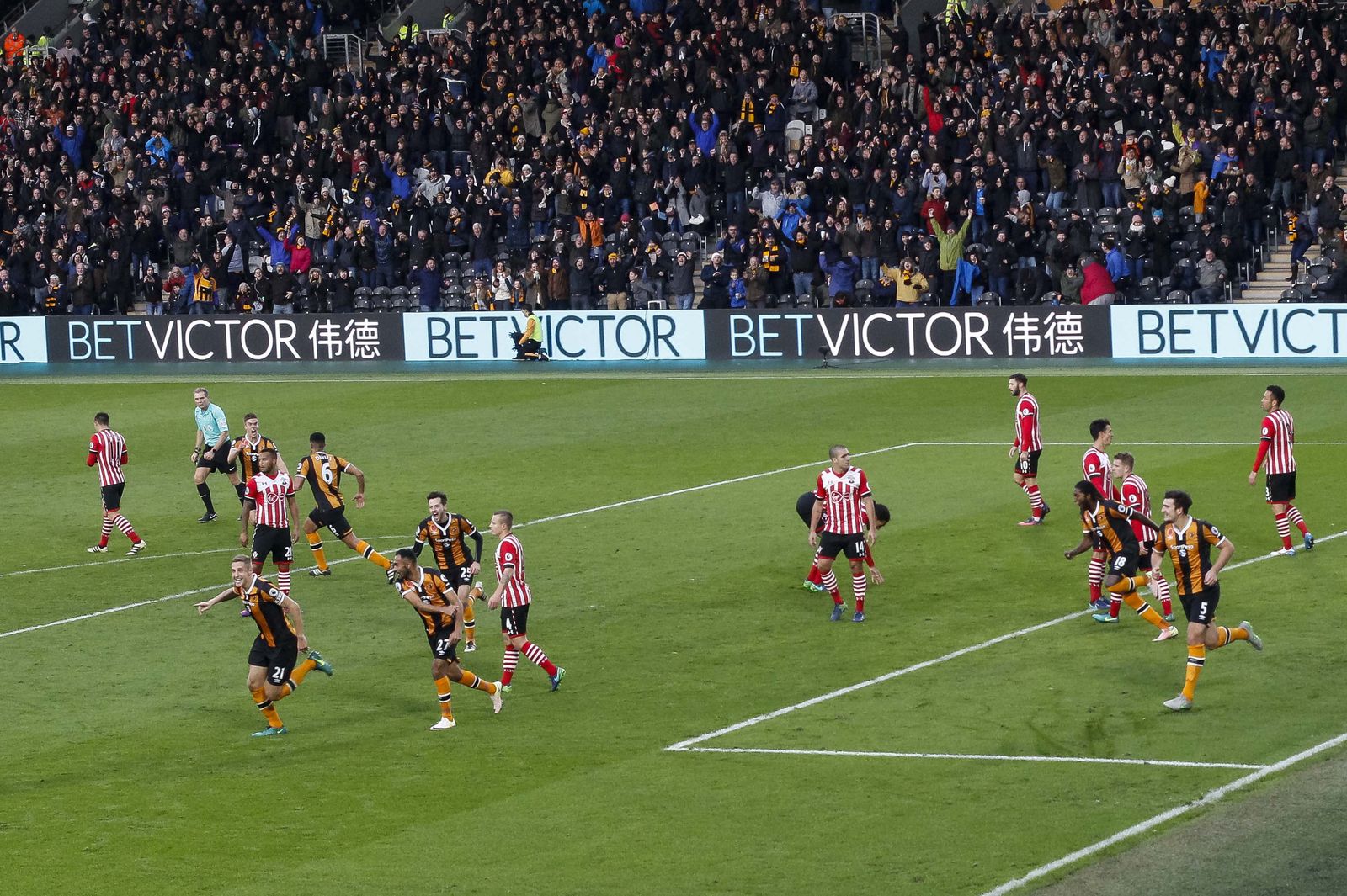 Michael Dawson celebrates his winner against Southampton. Shooting for the club has given me a bit more flexibility on where I can place remotes so I’ve been putting one up in the stands. It’s not worked out very often but occasionally it produces some nice photos. (80mm, ISO2000, 1/500th, f6.3)