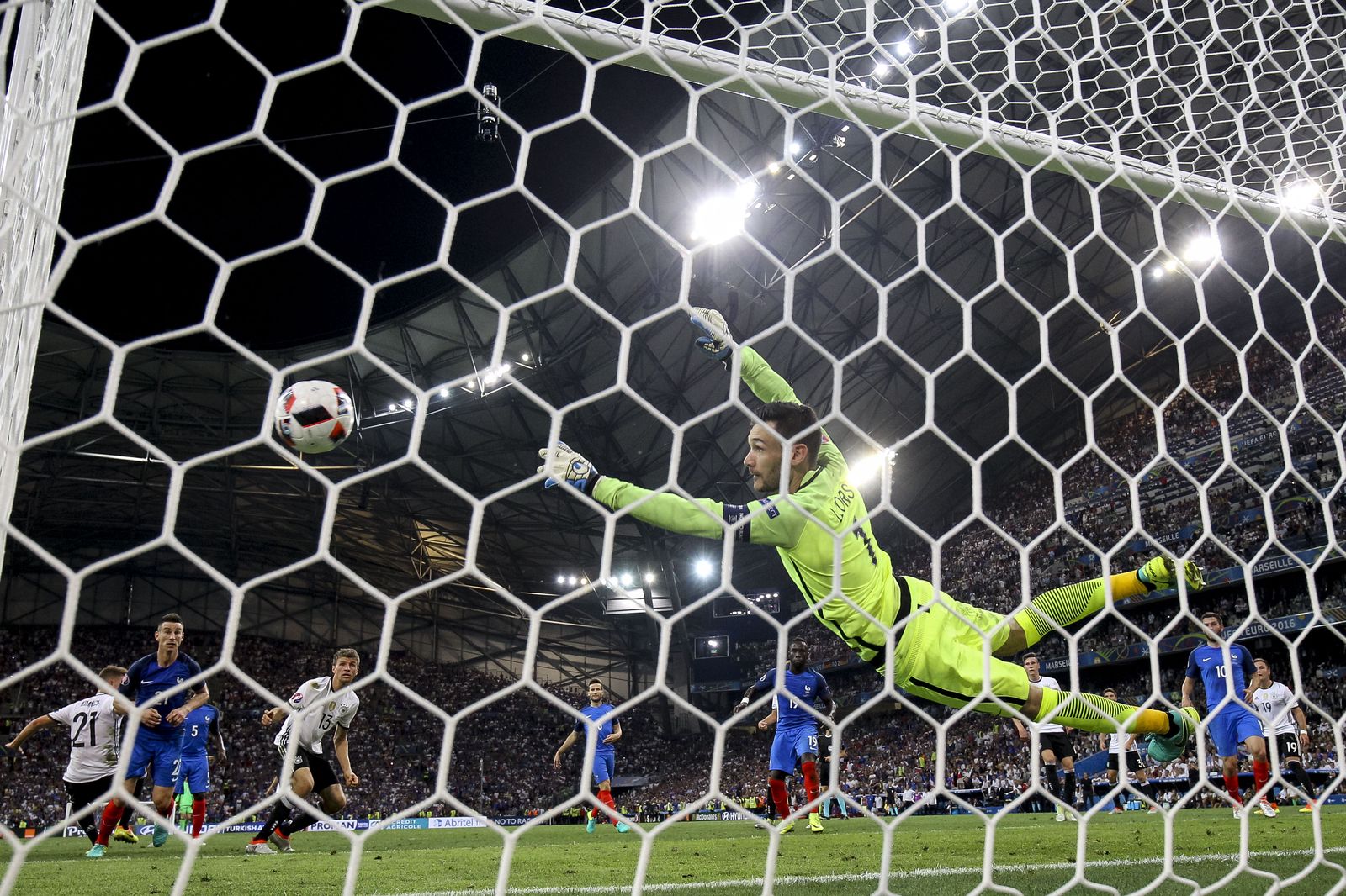 Hugo Lloris saves from Thomas Mueller. I really wanted a good remote pic from the Stade Velodrome as the roof is incredible, so I was pleased when in my last game there I looked at the back of the camera and saw this— it’s a shame the net was so thick but you can’t have it all. (21mm, ISO2500, 1/800th, f4)