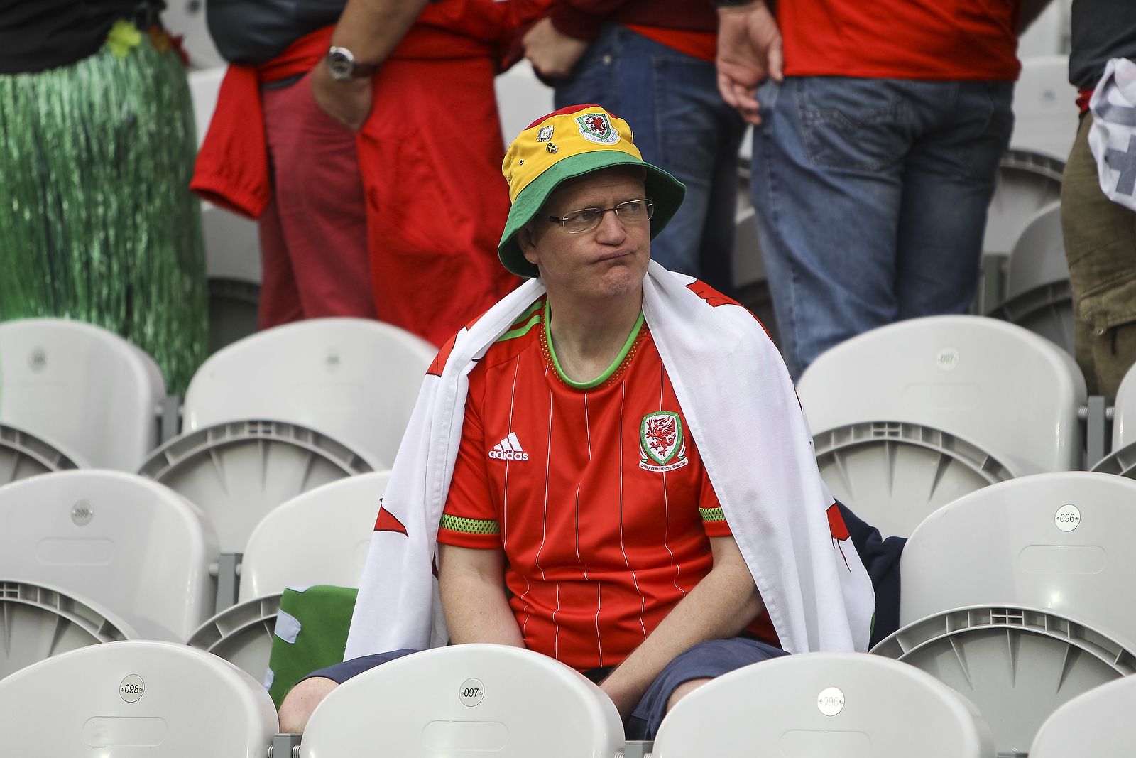 A Wales fan looks dejected