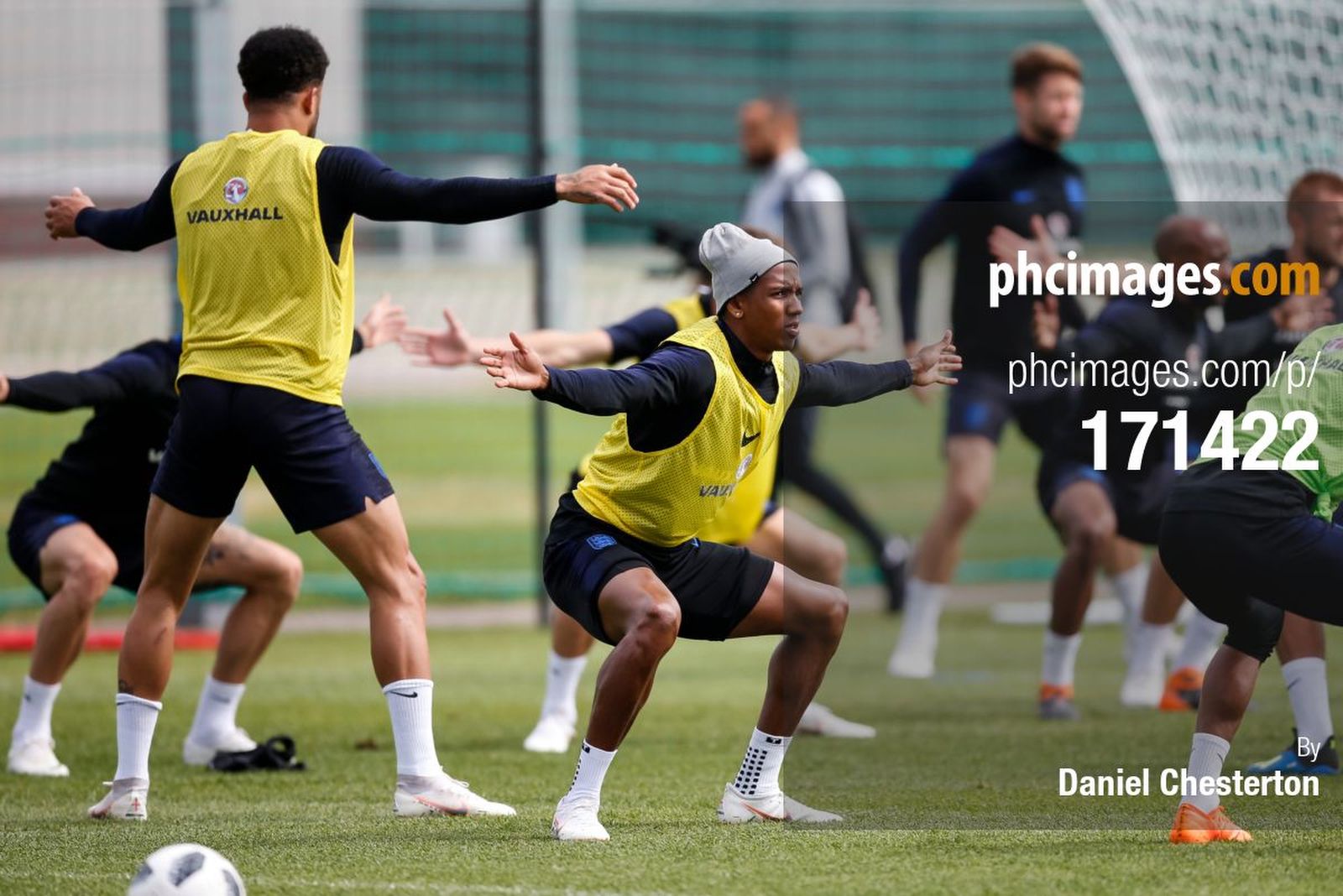 Ashley Young warms up