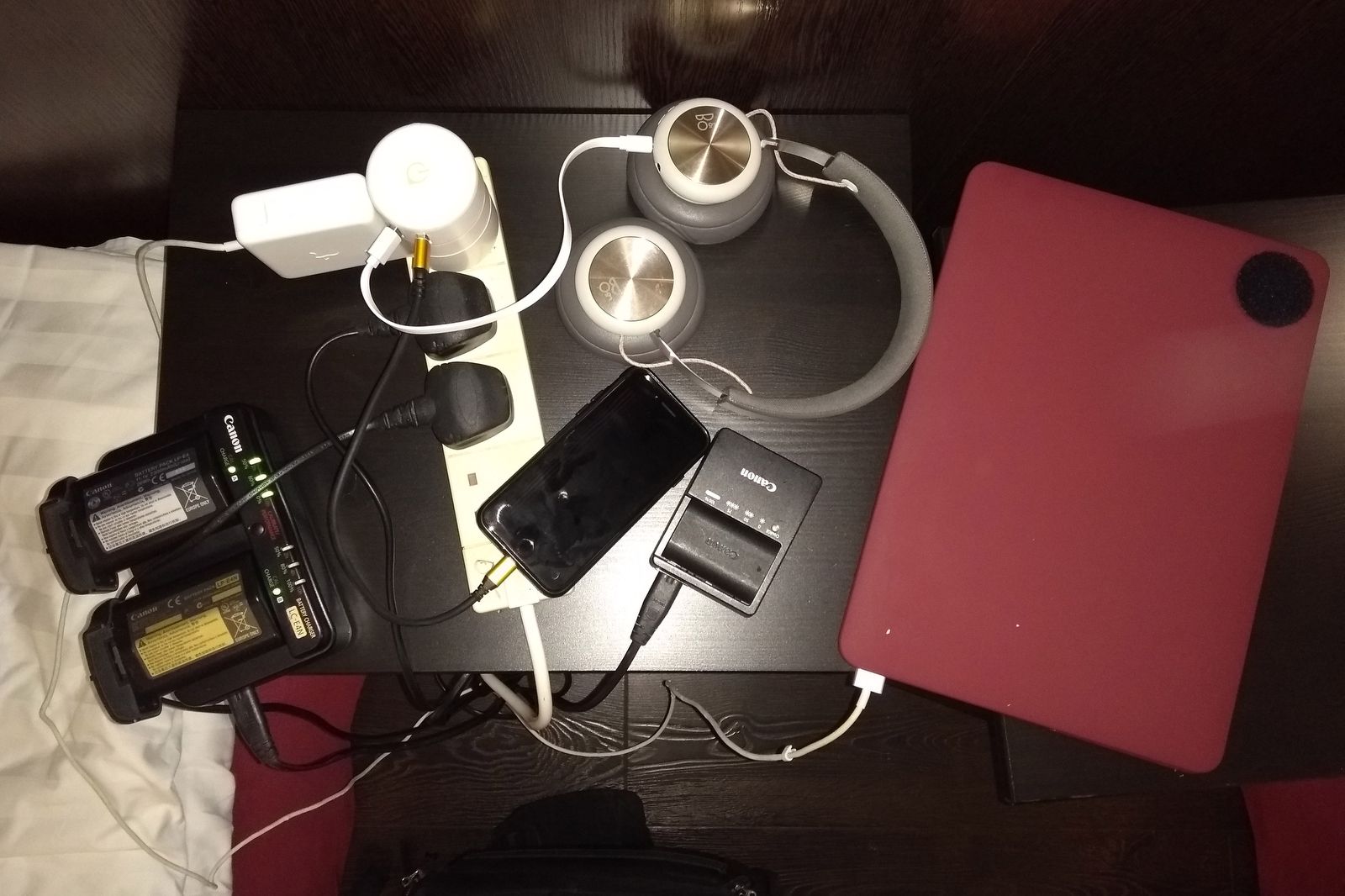 The life of a travelling photographer. Not pictured: an iPad, 2nd phone and power bar charging on the other side of the room