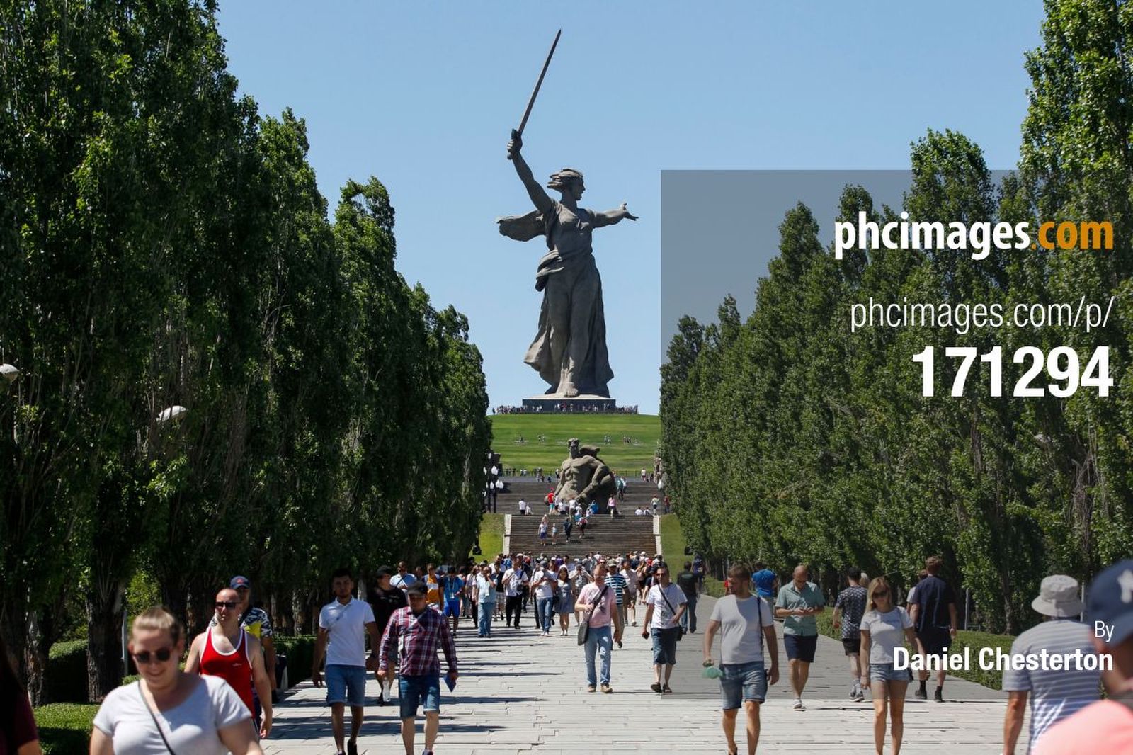 Fans near the stadium with the Motherland Calls statue in the background