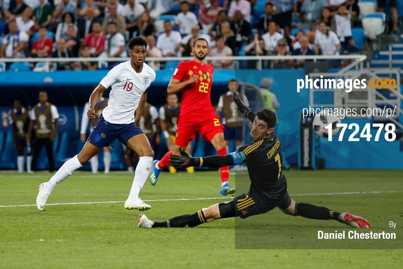 Thibaut Courtois watches on as his fingertip save from Marcus Rashford goes wide