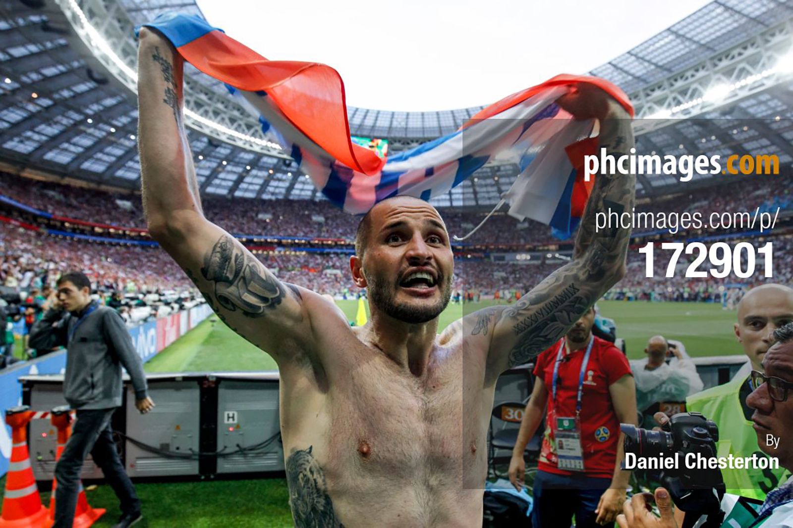 Fedor Kudryashov celebrates with a Russian flag