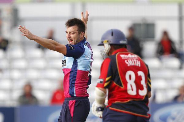 Toby Roland-Jones celebrates the dismissal of Greg Smith