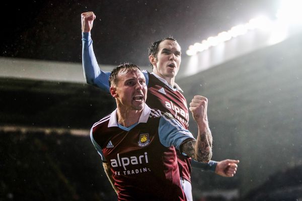 Matt Taylor and Joey O'Brien celebrate a goal against Tottenham