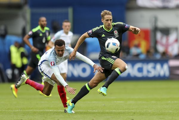 Dele Alli of England and David Edwards of Wales