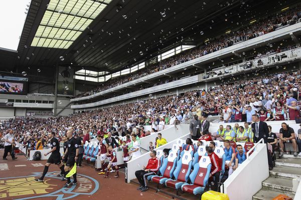 The players walk out before the match against Swansea