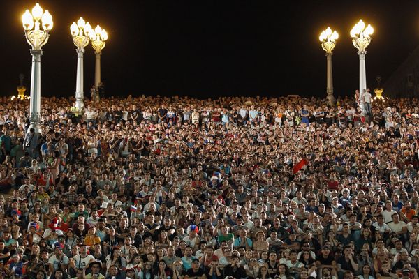 Russian fans watch their match against Egypt at a FIFA Fan Fest in Volgograd