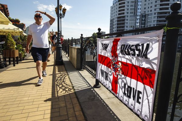 England fans relax before their match against Belgium