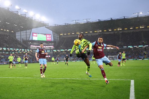 Arsenal's Eddie Nketiah and Burnley's Vitinho compete